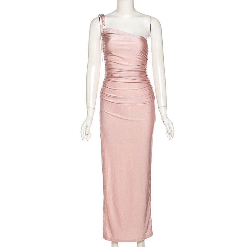 Pink ruched one-shoulder dress on a mannequin