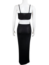 A black cutout maxi dress on a mannequin, back view.