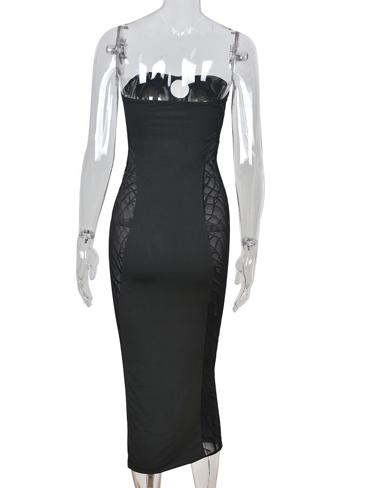 Back view of a black strapless bodycon maxi dress with sheer side panels.