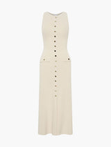 a cream ribbed knit sleeveless midi dress with gold buttons and pockets, and a slit hem, laid flat