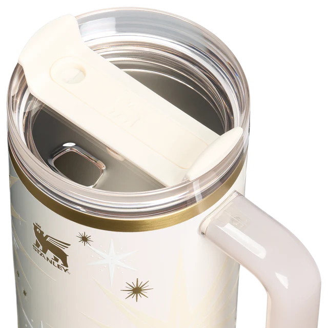 Stanley Celestial Star 40oz insulated tumbler in soft cream with gold starburst pattern and hanging star charm - View 6 | Clistos