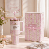 Stanley Blush Lilac Floral 40oz insulated tumbler with matching pastel gift box and bow straw topper - View 1 | Clistos