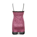 Pink leopard print slip dress with black lace trim on a white background, back view.