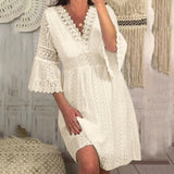 Full body shot of the white lace dress