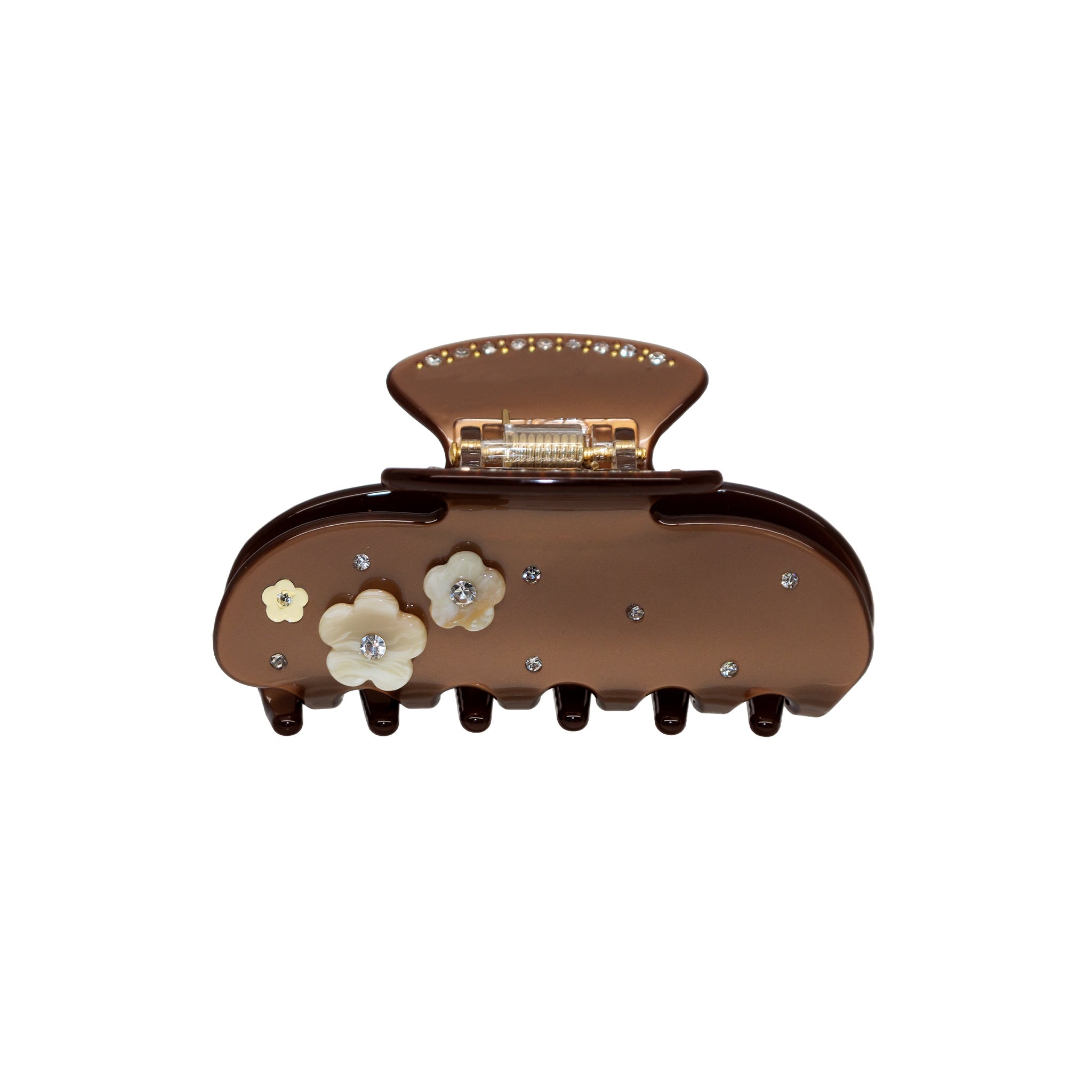 A brown claw clip with flower and rhinestone details.