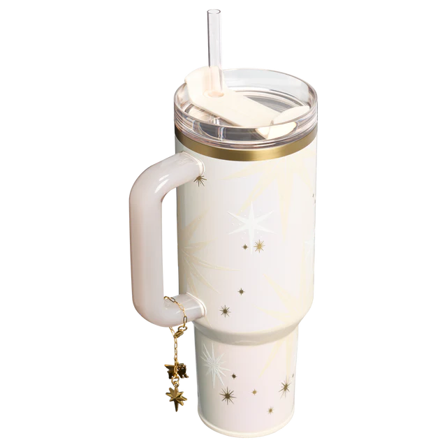 Stanley Celestial Star 40oz insulated tumbler in soft cream with gold starburst pattern and hanging star charm - View 5 | Clistos