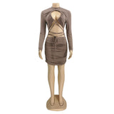 Mannequin wearing a brown long-sleeved, cut-out, lace-up, ruched mini dress.