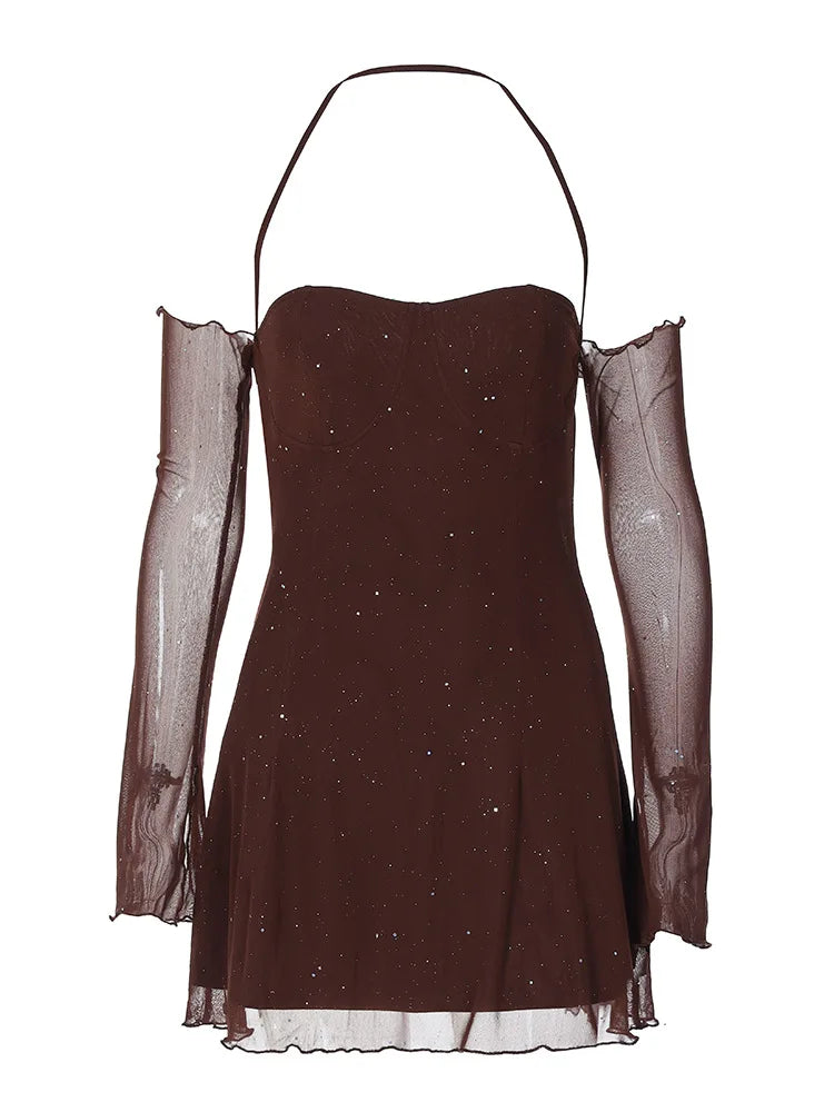 A brown, sparkly mini dress with sheer, off-the-shoulder sleeves and a halter neckline is displayed against a white background.