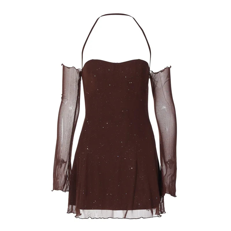 A brown, sparkly mini dress with sheer, off-the-shoulder sleeves and a halter neckline is displayed against a white background.