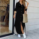 woman in a black maxi shirt dress with a high slit