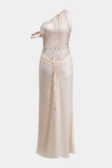 A cream one-shoulder satin maxi dress with tie details at the neckline and waist, and cut-out details.