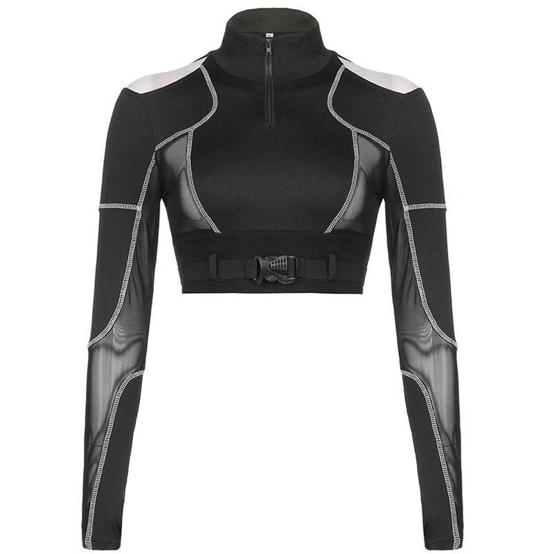 Front view of a black long-sleeved crop top with mesh panels, cut-out shoulders, zip-up front, and buckle detail.