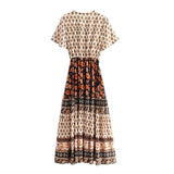 back view of a floral print maxi dress