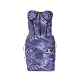 A purple and black patterned mini dress with a corset bodice and lacing details.