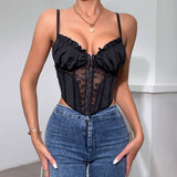 front view of a black lace and ruched corset top with a zipper closure and adjustable straps, worn with blue jeans