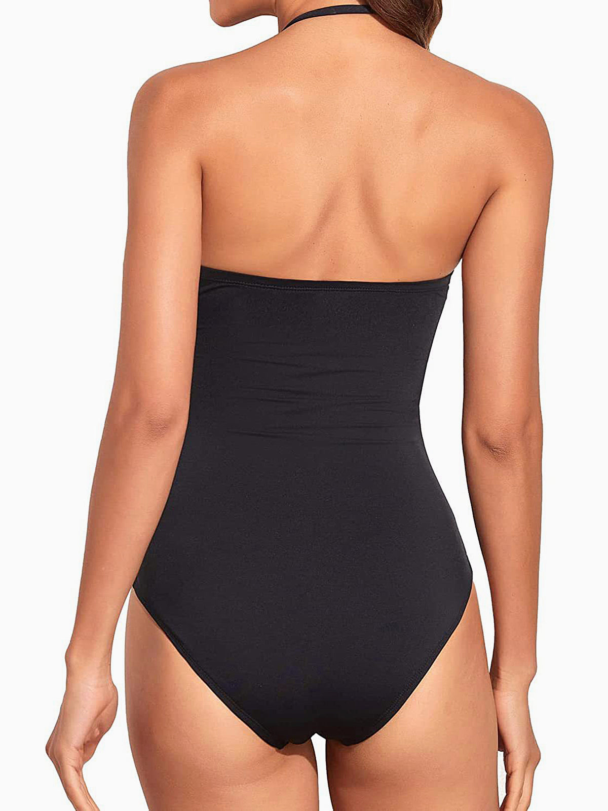 back view of woman in black strapless one-piece swimsuit