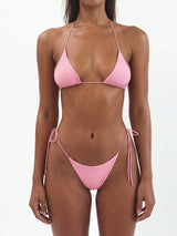 woman wearing a pink string bikini