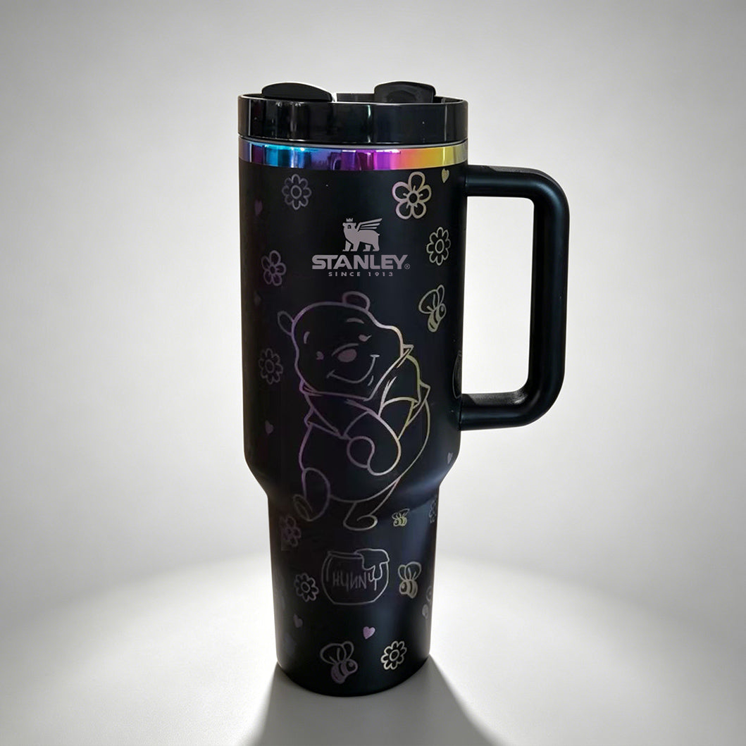 Stanley Winnie the Pooh 40oz insulated tumbler with handle and straw featuring honey bee doodles - View 3 | Clistos