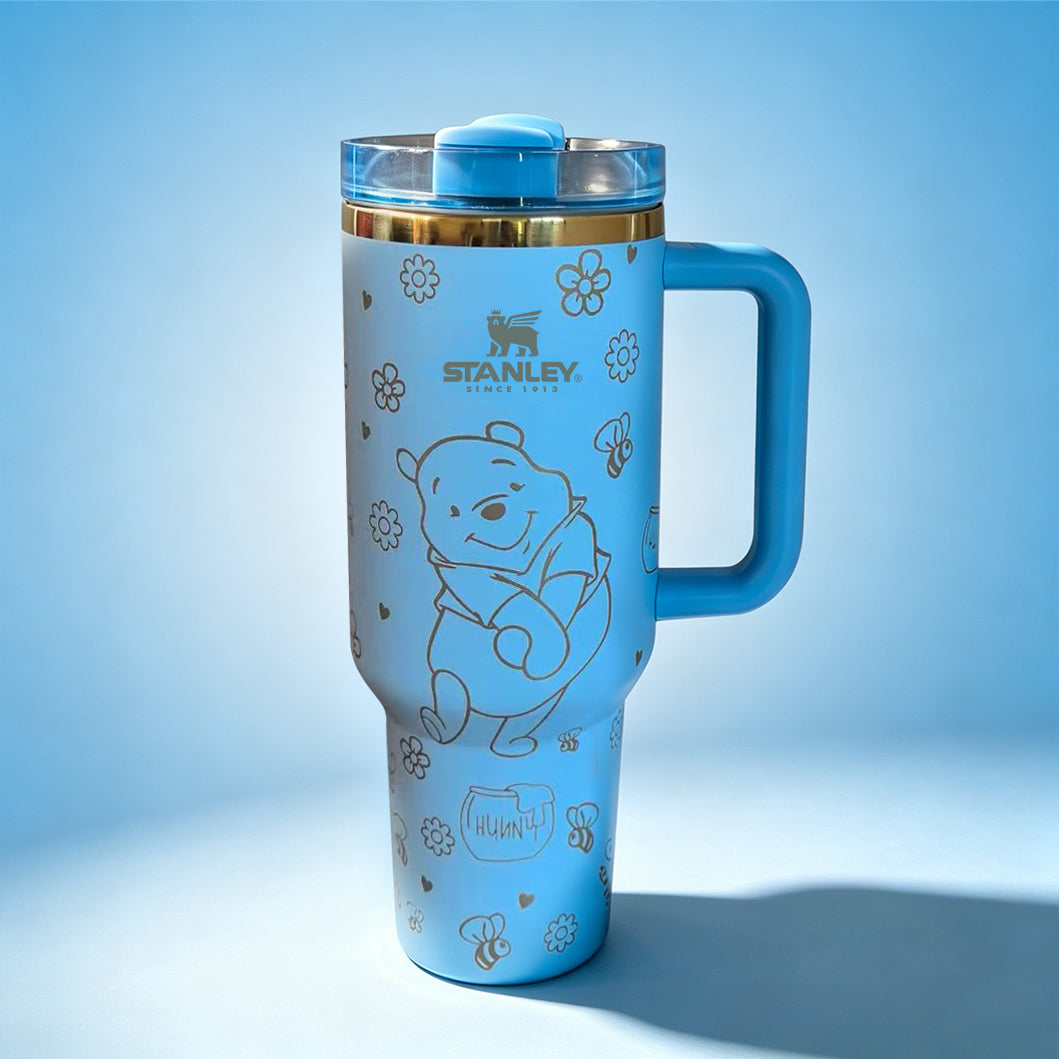 Stanley Winnie the Pooh 40oz insulated tumbler with handle and straw featuring honey bee doodles - View 4 | Clistos