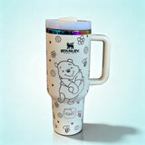 Stanley Winnie the Pooh 40oz insulated tumbler with handle and straw featuring honey bee doodles - View 1 | Clistos