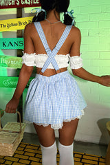 Back view of a woman in a Dorothy costume