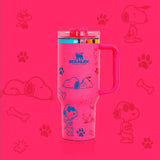 Stanley Snoopy 40 oz insulated tumbler in white with blue Peanuts illustrations, ergonomic handle, and straw - View 4 | Clistos