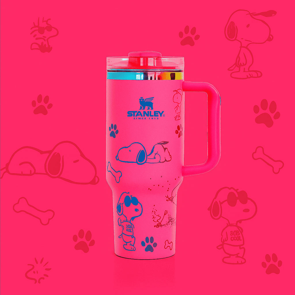 Stanley Snoopy 40 oz insulated tumbler in white with blue Peanuts illustrations, ergonomic handle, and straw - View 4 | Clistos