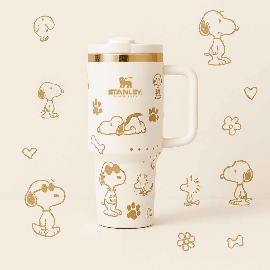 Stanley Snoopy 40 oz insulated tumbler in white with blue Peanuts illustrations, ergonomic handle, and straw - View 5 | Clistos