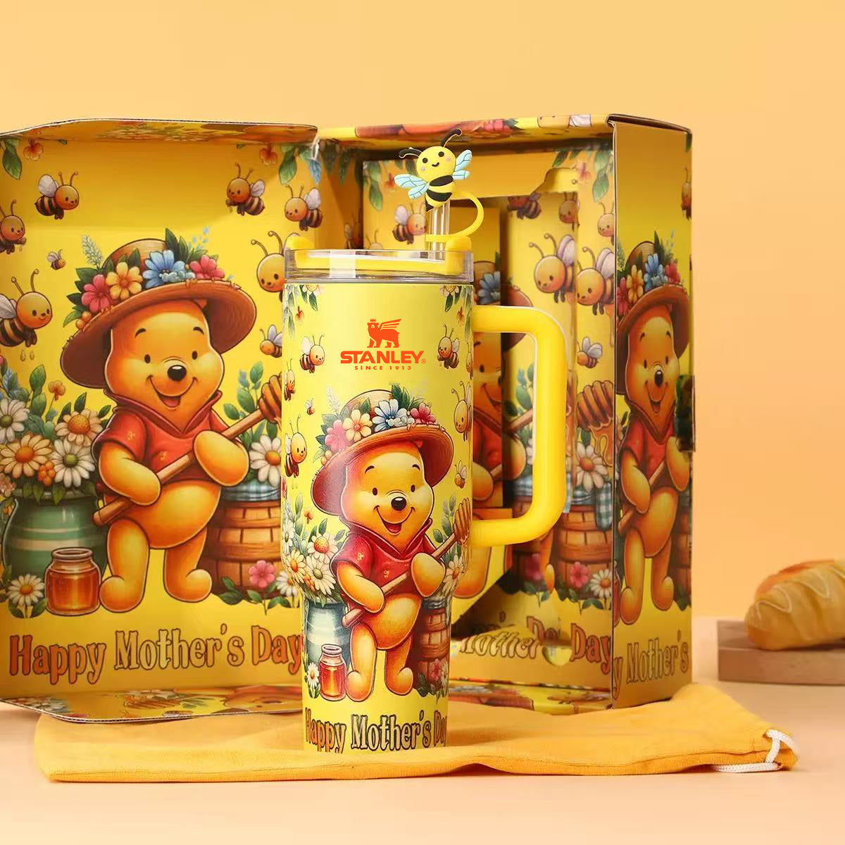 Stanley 40oz Winnie the Pooh Mom Tumbler Gift Set with matching illustrated collector box and bee straw topper - View 1 | Clistos