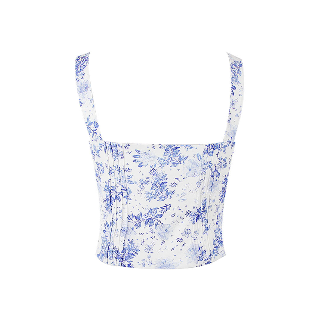 Back view of a white and blue floral print corset top