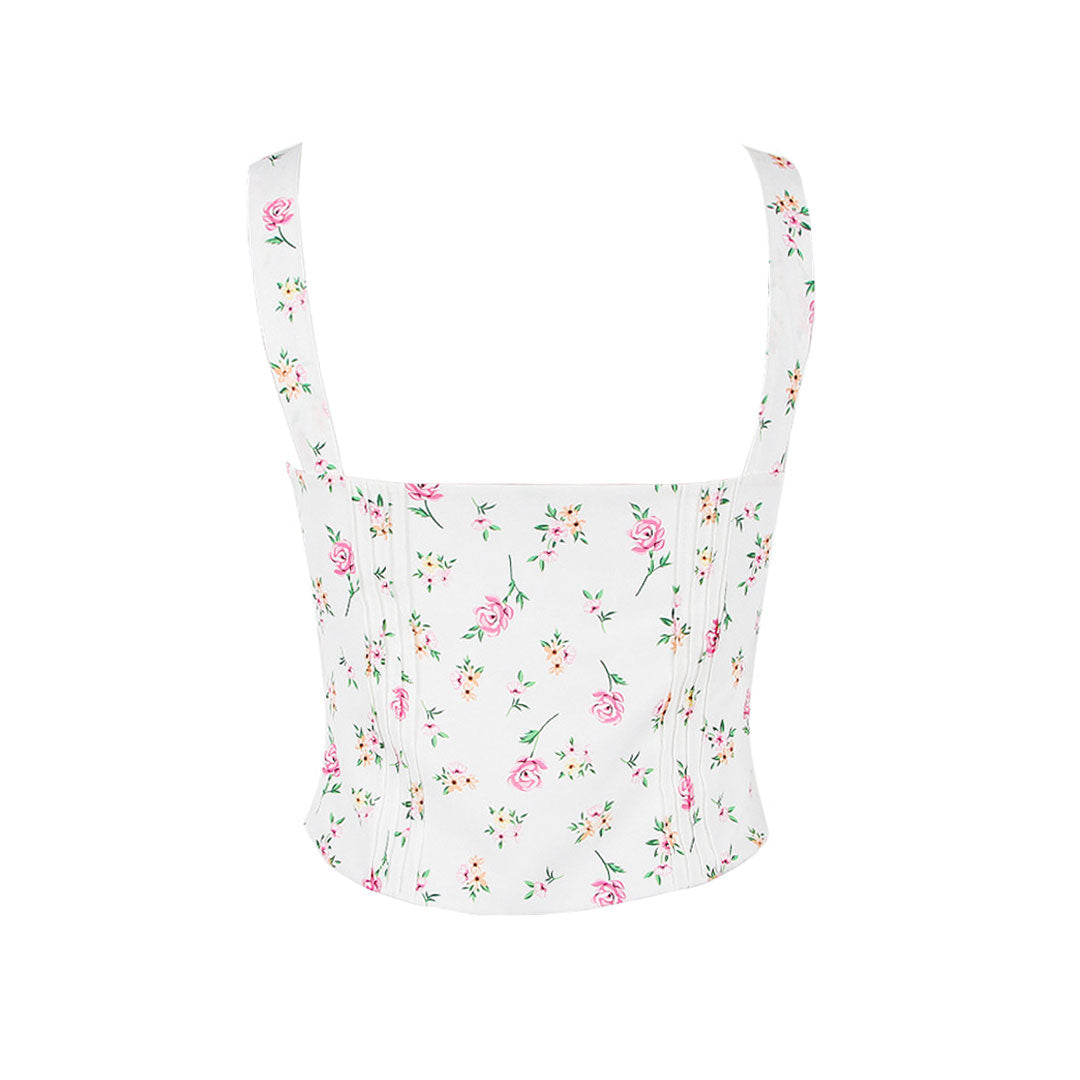 Back view of a white floral print corset top with spaghetti straps.