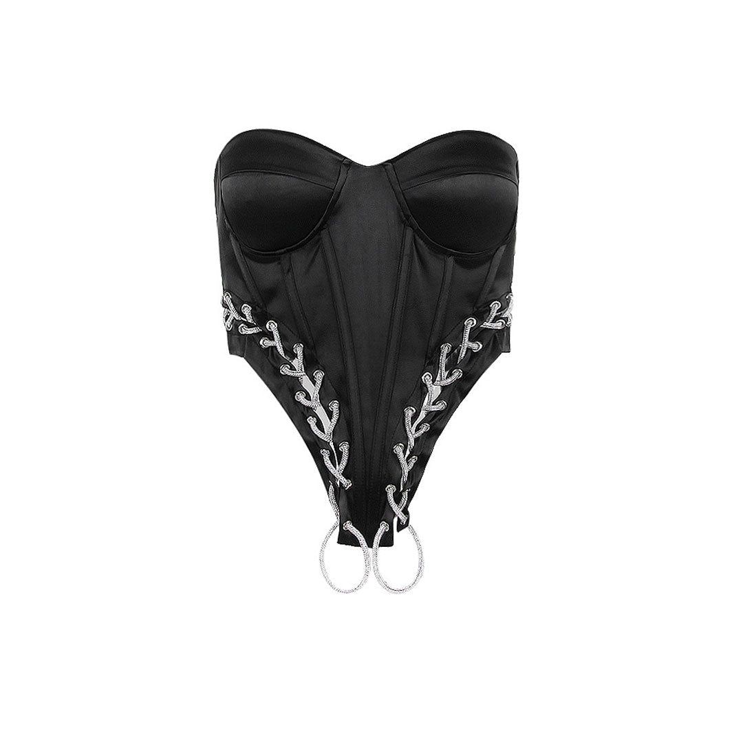 A black strapless corset top with lace-up and chain detailing, and two silver rings at the bottom.