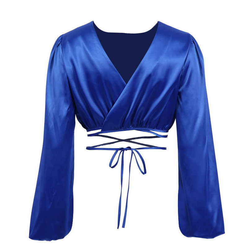 blue satin crop top with long sleeves and tie waist
