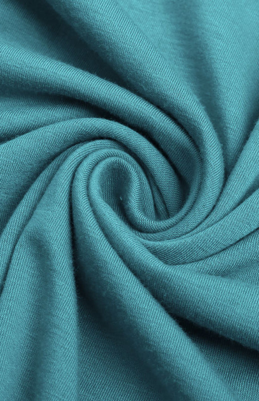 Close-up of the teal jersey knit fabric.