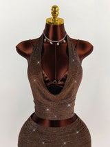 Close-up of the brown sparkly halter neck crop top with a cowl neckline and a bralette underneath.