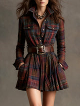Close-up of a plaid shirt dress with a brown belt