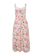 A pink floral midi dress with a corset-style bodice and lace trim.