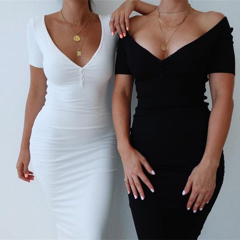 Two women, one in white and one in black, wearing matching off-the-shoulder ruched bodycon dresses.