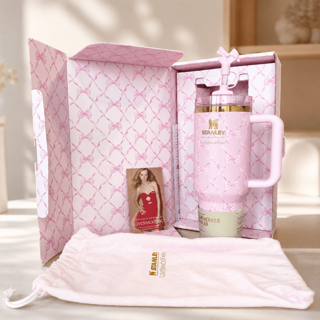 Stanley x LoveShackFancy Pink Bow 40oz Insulated Tumbler Gift Set with matching pink gift box and bow straw topper - View 4 | Clistos