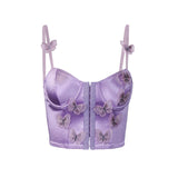 front view of a purple satin corset top with butterfly embellishments