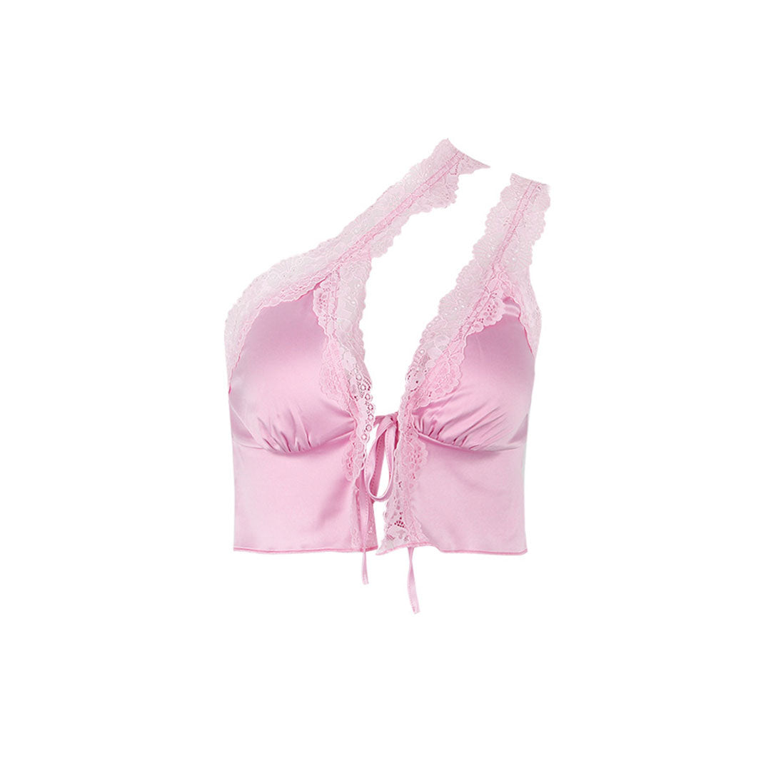 A pink one-shoulder satin crop top with lace trim and a tie-front closure.