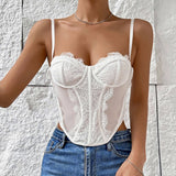 Close-up of a white lace corset top with intricate detailing.