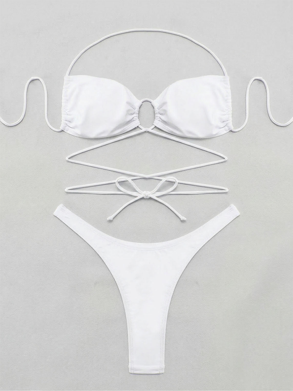 White bikini laid out flat