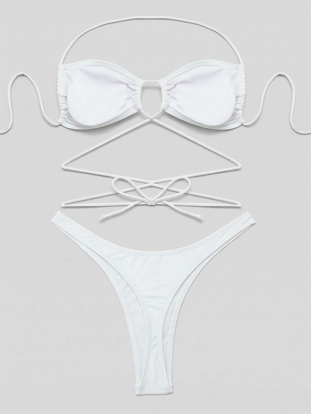 White bikini laid out flat