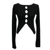 A black long-sleeve top with a scoop neckline and cut-out details.