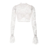 a white lace crop top with long sleeves and flared cuffs