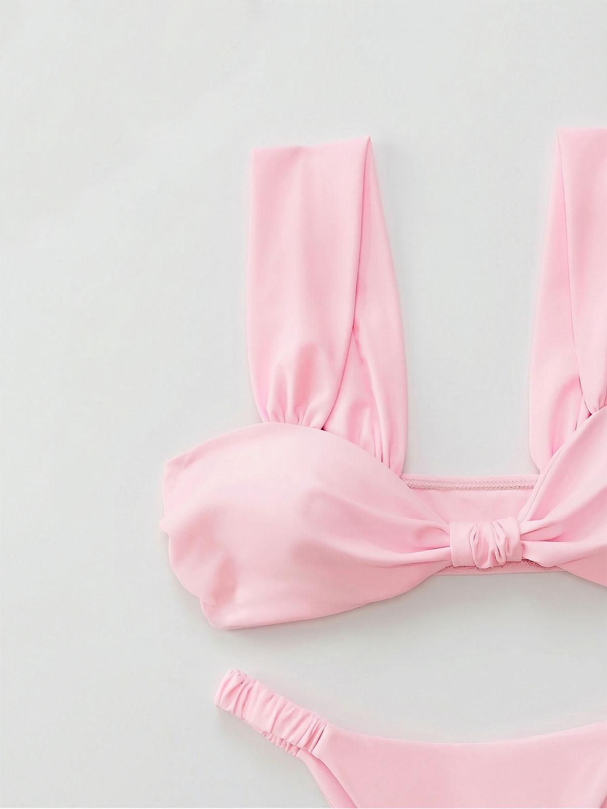 Close-up of a pink bikini top and bottom