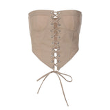 A close-up of a beige strapless corset top with a lace-up front and a tie at the bottom, isolated on a white background.