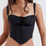 Close-up of a black corset top with adjustable drawstring bust.
