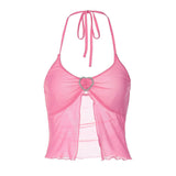 Close-up of a woman's chest showing a pink halter neck cropped top with a heart-shaped embellishment